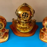 Bronze and brass diving suit with wooden base.